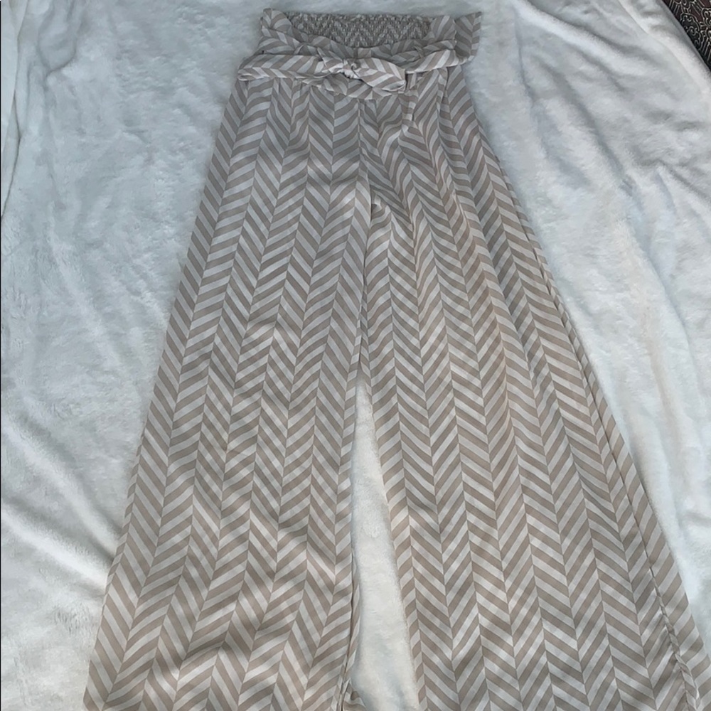 Sheer tan and white flared pants